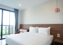 Номер Executive в Riqueza Suites Pattaya