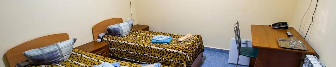 Номер стандарт с 2 односпальными кроватями (без окна) в Сулак