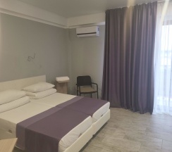 Двухместный номер с 2 отдельными кроватями и дополн. кроватью в GB