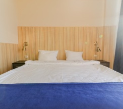 Стандартный трехместный номер с диваном в Hotel Kuchugury