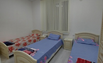 Кровать в 3-местном общем номере в Беной Тревел