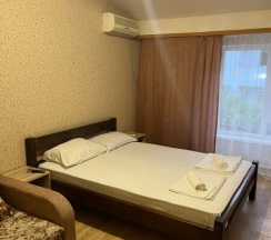 Двухместный стандарт с 1 двуспальной кроватью и 1 односпальным диваном в Надежда