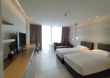 Номер Deluxe в ashley hotel bkk