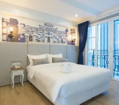 Двухместный номер Deluxe с балконом двуспальная кровать в White Ivory Bed & Breakfast