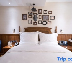 Двухместный номер Standard двуспальная кровать в Yake Town Holiday Hotel (Dehui Branch)