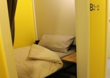 Кровать в общем номере в Stamps Backpackers Hostel