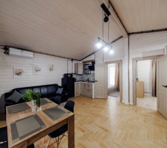 Двухместный коттедж двуспальная кровать в Винни-Вилла