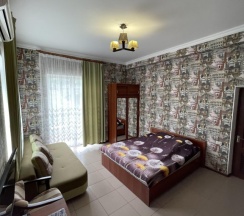Трёхместный номер Deluxe с балконом и с красивым видом из окна в Stone house