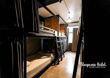 Кровать в общем номере в Sleepcase Hostel