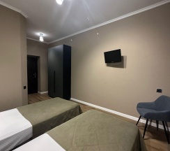 Номер стандарт с 2 односпальными кроватями с балконом в Альпина