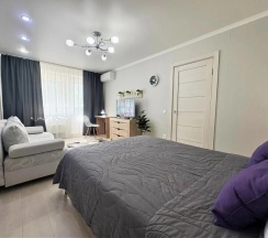 Четырёхместные апартаменты c 1 комнатой с балконом в Апартаменты Sweet Marshmallow SUTKI LIFE