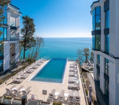 Duplex с видом на море и бассейн в Лучезарный Резорт