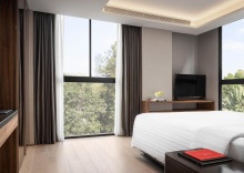 Одноместный люкс c 1 комнатой в Walton Suites Sukhumvit