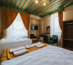 Двухместный люкс двуспальная кровать в La Casa Cave