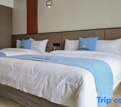 Двухместный номер Standard с балконом и с видом на море 2 отдельные кровати в Taishan Golden Beach Resort