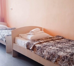 Кровать в 4-местном общем номере в Smart Hotel KDO Пенза