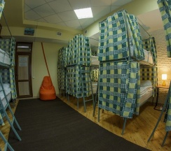 Кровать в общем номере в Good Inn