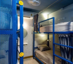 Кровать в общем номере в The Moon Hostel Hua Hin
