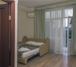 Двухместный люкс с 2 комнатами с балконом 2 отдельные кровати в Аист