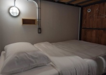 Кровать в общем номере в Sleepcase Hostel