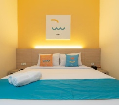 Двухместный номер Economy двуспальная кровать в Sans Hotel Bubulak Bogor