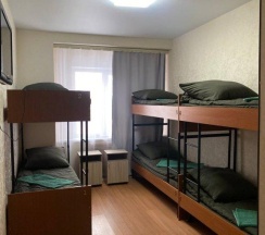 Кровать в общем 6-местном номере (общие удобства) в Визит