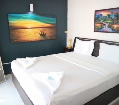 Двухместный номер Deluxe с балконом двуспальная кровать в Sunshine Guest House