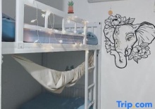 Кровать в общем номере в 1Sabai Hostel