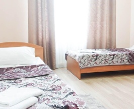 Кровать в 3-местном общем номере в Smart Hotel KDO Тамбов