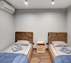 Стандарт двухместный с 2 отдельными кроватями и общей ванной №5 в Fenix