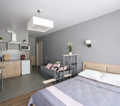 Студия Powder и Aquamarine с одним окном в New Horizon Ovechkin Apartments