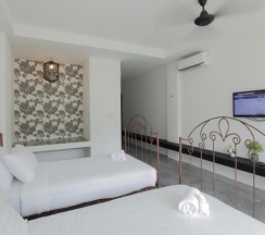 Двухместный номер Deluxe с балконом двуспальная кровать в Surintra Boutique Resort