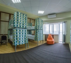 Кровать в общем номере в Good Inn