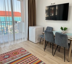 Двухуровневый ПОЛУЛЮКС с зоной отдыха на крыше и видом на бассейн в Santorini Family Club