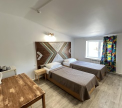 Номер стандарт с 2 односпальными кроватями в Домино