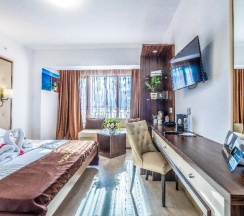 Двухместный номер Premium c 1 комнатой с балконом двуспальная кровать в Prestige Hotel and Aquapark