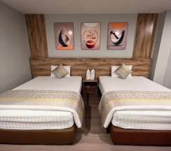 Четырёхместный номер Deluxe 2 отдельные кровати в Berich Hotel