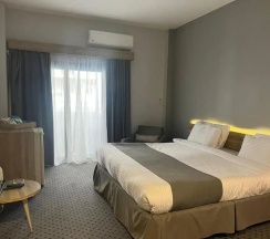 Двухместный номер (двуспальная кровать) в Atlas International Hotels