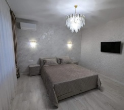 Шестиместный коттедж с балконом и рядом с пляжем в Гостевой дом