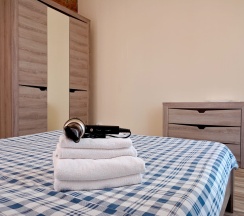 Апартаменты/Семейный трёхкомнатный номер с большими двуспальными кроватями в Морской