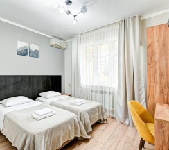 Комната стандарт с 2 односпальными кроватями с видом на террасу в Белая Лилия