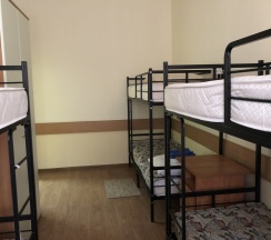 Кровать в общем номере в Домино