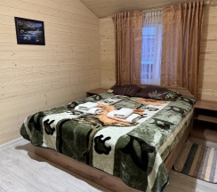 Домик у пруда в Ирбис