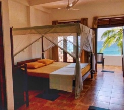 Двухместный номер Standard с видом на море двуспальная кровать в Jasmine Garden Beach Guest House