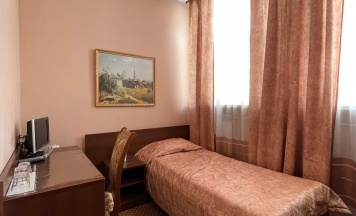 Кровать в 3-местном общем номере в Отель на Советской