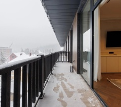 Люкс с балконом и с видом на горы в Dombay winter hall
