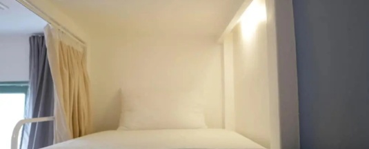 Кровать в общем номере в Sleepy Owl Hostel