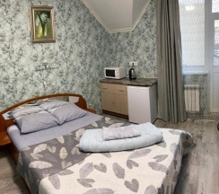 Двухместный номер Standard с балконом и с красивым видом из окна двуспальная кровать в Дюна-центр