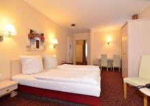 Четырёхместный номер Standard в Hotel Behrmann