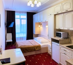 Студия с кухней и двумя односпальными кроватями в Calypso